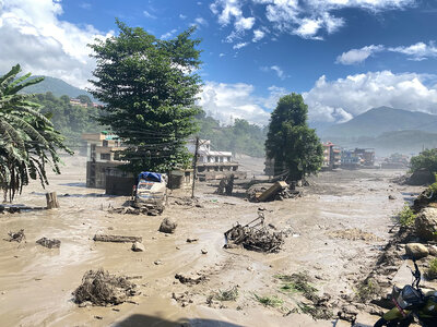 A severe flash flood has destroyed homes and critical infrastructure in Nepal; hundreds of people are missing. | © Keystone/XINHUA/RSS